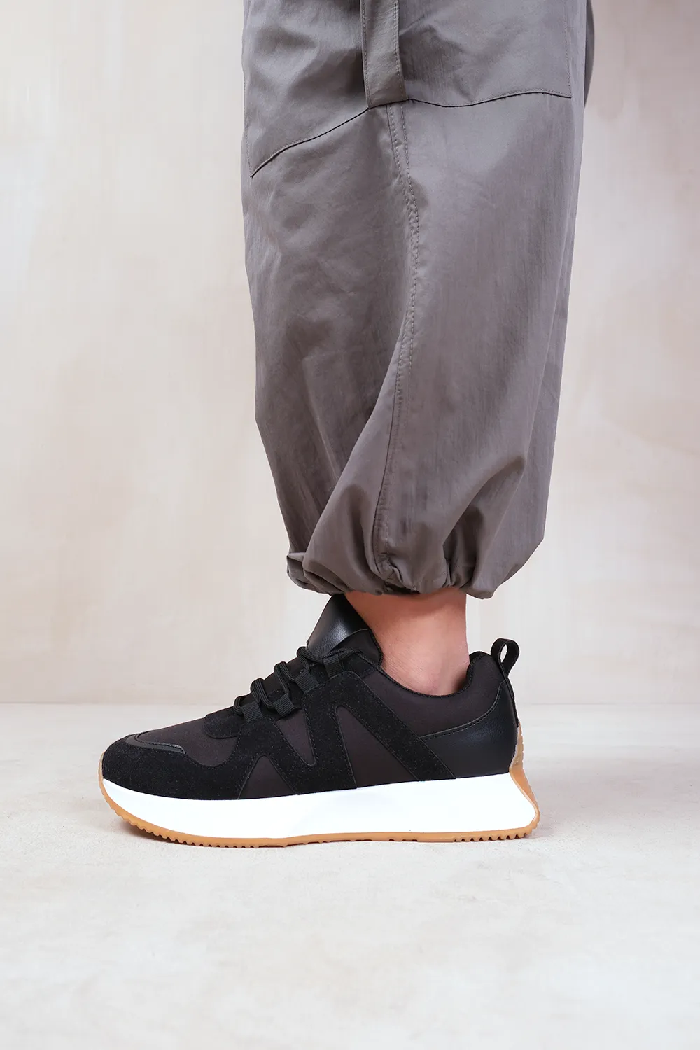 MOMENTUM RUNNER SNEAKER TRAINERS WITH SUEDE DETAIL IN BLACK FAUX LEATHER