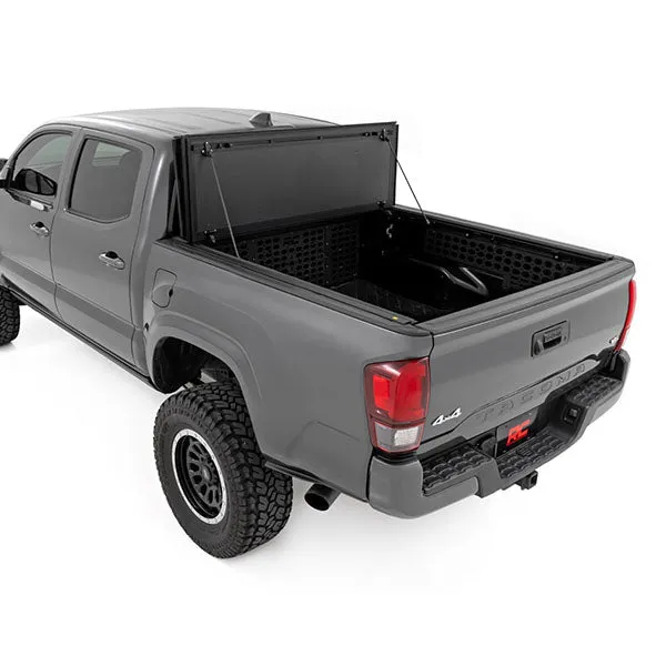 Rough Country Hard Tri-Fold Flip Up Bed Cover | 2016-2023 Toyota Tacoma