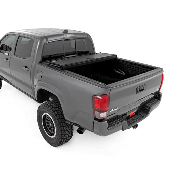 Rough Country Hard Tri-Fold Flip Up Bed Cover | 2016-2023 Toyota Tacoma