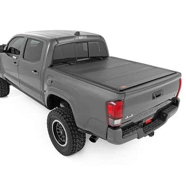 Rough Country Hard Tri-Fold Flip Up Bed Cover | 2016-2023 Toyota Tacoma