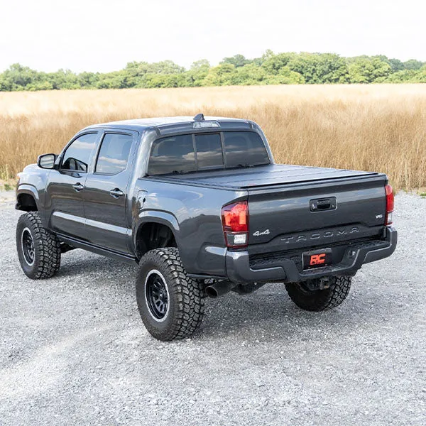 Rough Country Hard Tri-Fold Flip Up Bed Cover | 2016-2023 Toyota Tacoma