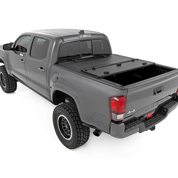 Rough Country Hard Tri-Fold Flip Up Bed Cover | 2016-2023 Toyota Tacoma